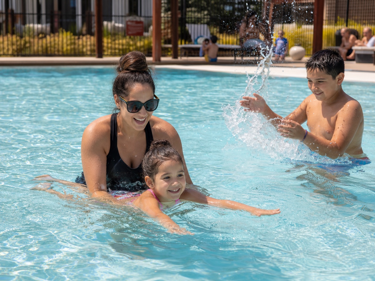 A bright pool representing family-friendly hotel amenities